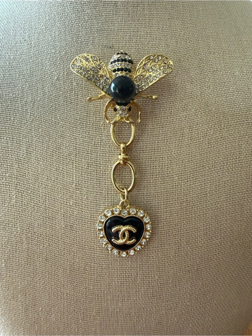 Gold Bee Brooch with Black Enamel Heart and Crystal Accents